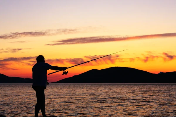 Pesca ao pôr do sol — Fotografia de Stock