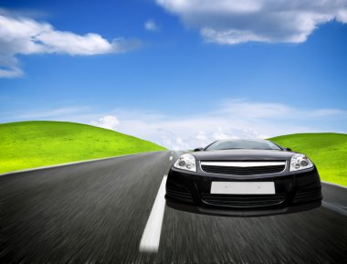 Sports car moving on the mountain road clipart