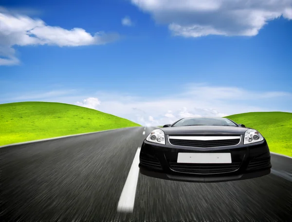 Sports car moving on the mountain road — Stock Photo, Image