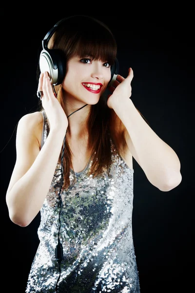 Mujer alegre con auriculares — Foto de Stock