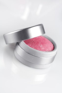 Close up view of face powder on white back clipart