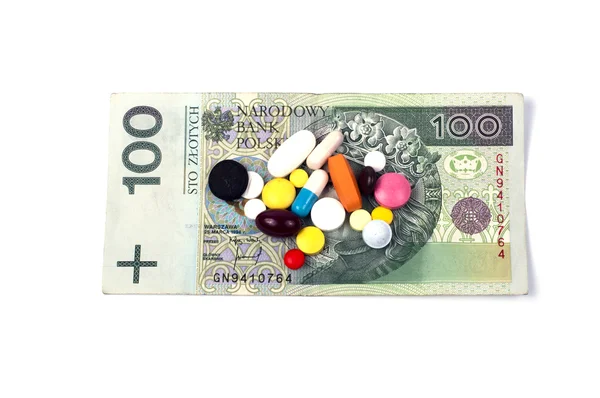 Pillen auf den Banknoten — Stockfoto