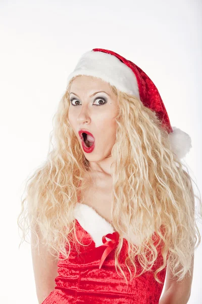 Σέξι κορίτσι με ξανθιά σγουρά μαλλιά, ντυμένοι ως Σάντα τη διασκέδαση για τα Χριστούγεννα — Φωτογραφία Αρχείου