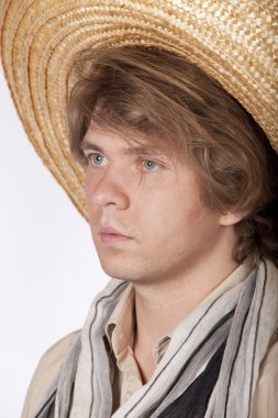 Close-up portrait of a mexican young man with sombrero looking sideways. See more in my portfolio. clipart