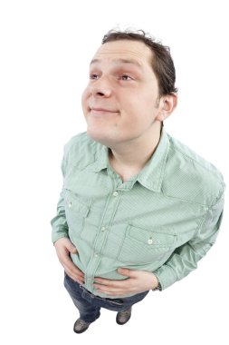 Hungry young man with hands on his belly clipart