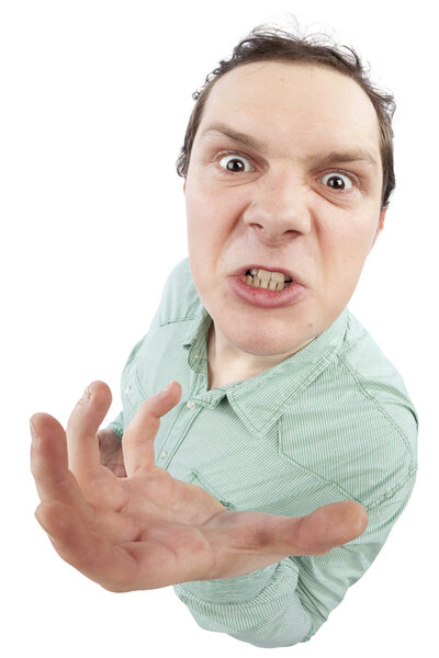 Distorted image of an angry young man gesturing. Fish-eye lens used. Studio shot. Isolated on pure white background.