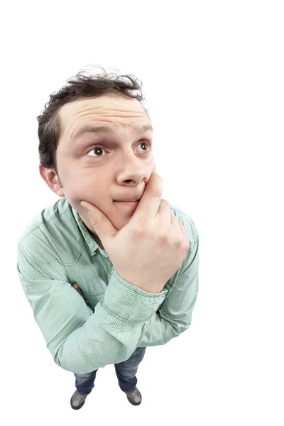 Confused young man thinking Stock Image