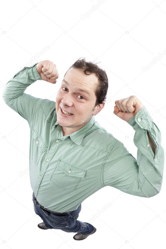 Silly smiling man showing off his muscles