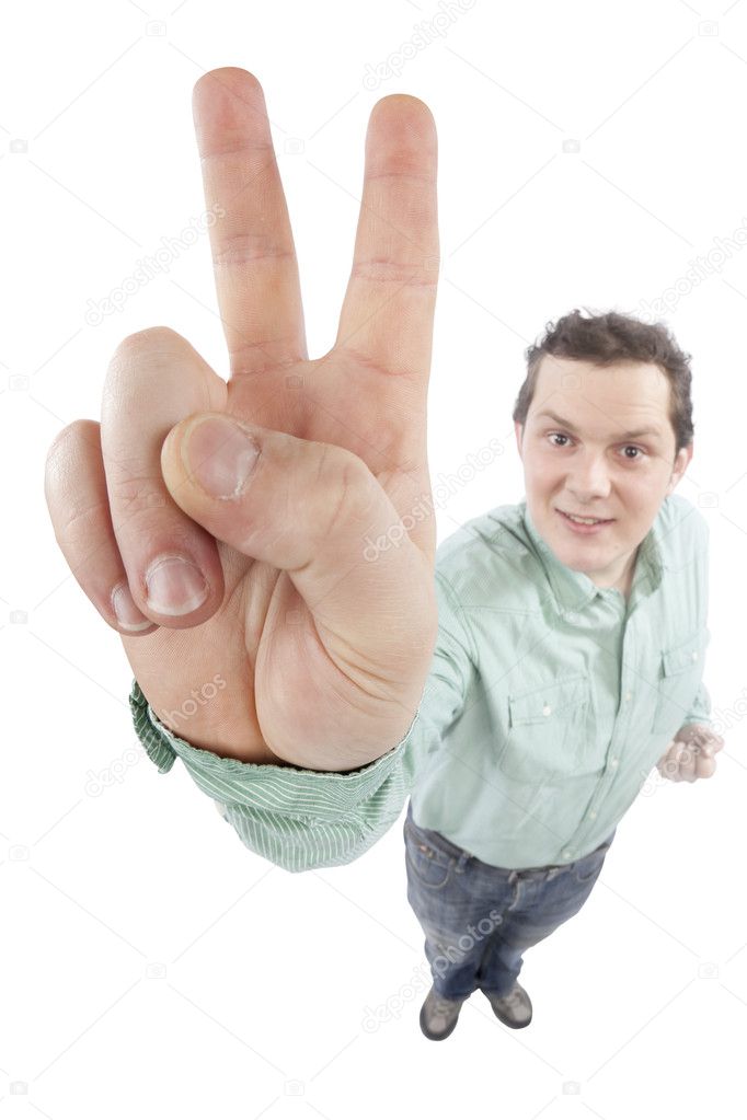 Young man gesturing victory sign