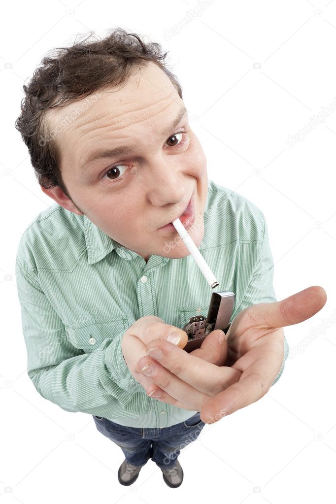 Young man lighting his cigarette