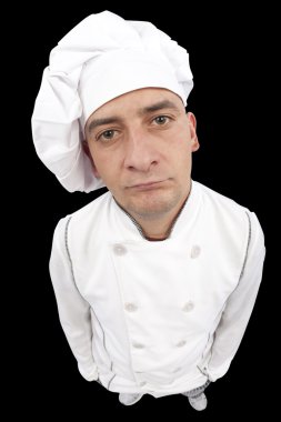 Serious young chef looking at camera clipart