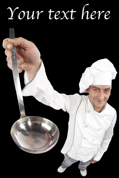 Lachende jonge chef-kok met pollepel — Stockfoto