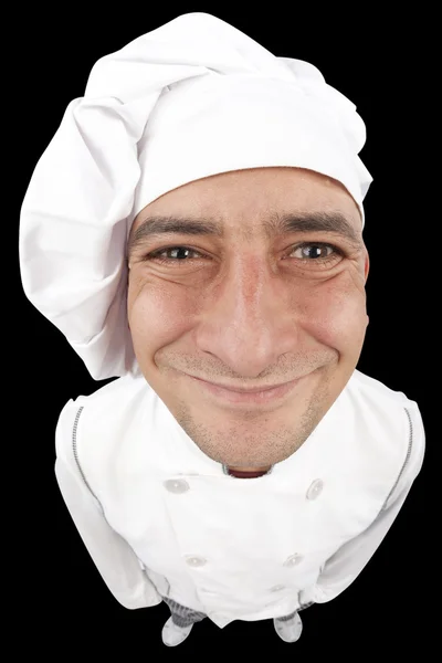 Смешной молодой шеф-повар улыбается — стоковое фото