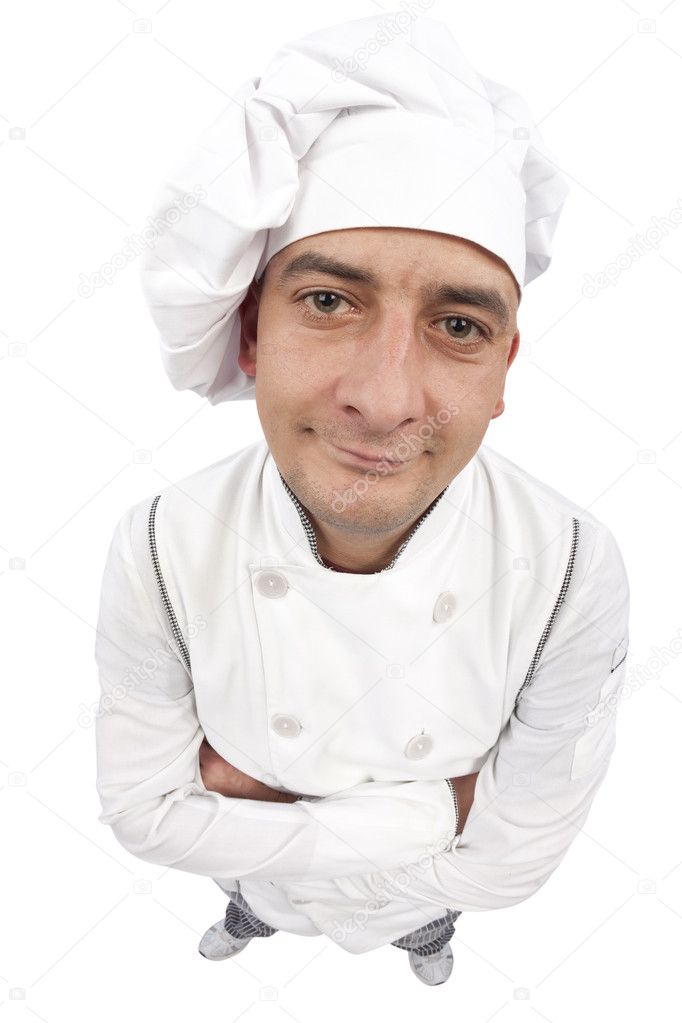 Funny young chef with arms crossed