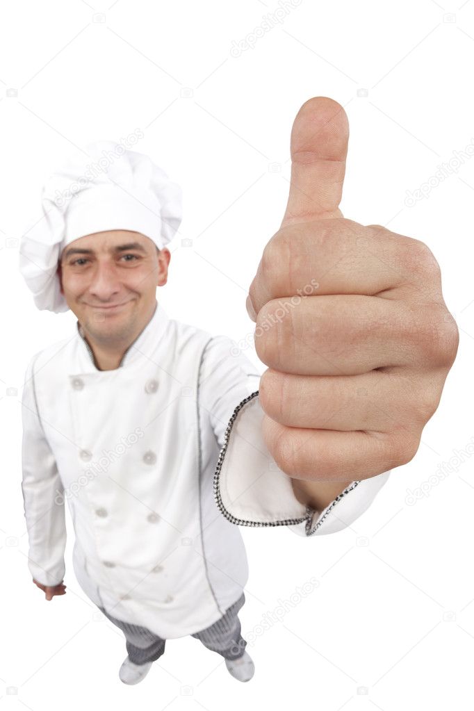 Young chef gesturing OK sign
