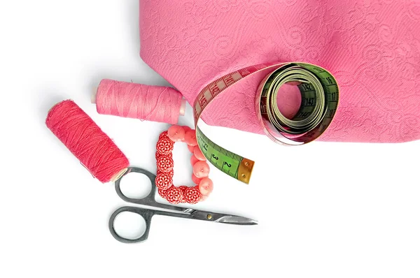 Acessórios rosa com tecido — Fotografia de Stock