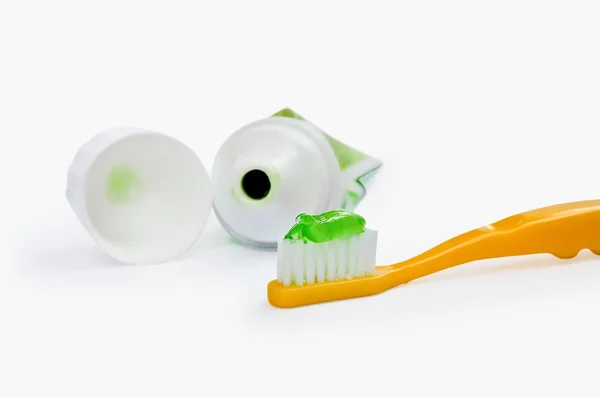 Зубная щетка с трубкой — стоковое фото