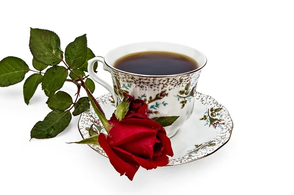 Καφέ σε ένα φλιτζάνι με ένα τριαντάφυλλο — Φωτογραφία Αρχείου