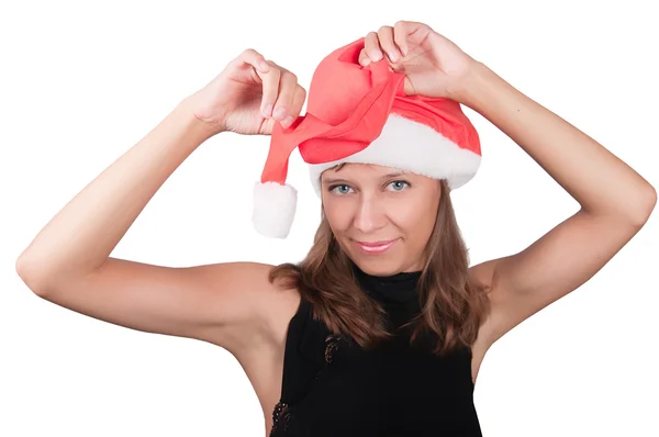 Das Mädchen mit der roten Weihnachtsmannmütze — Stockfoto