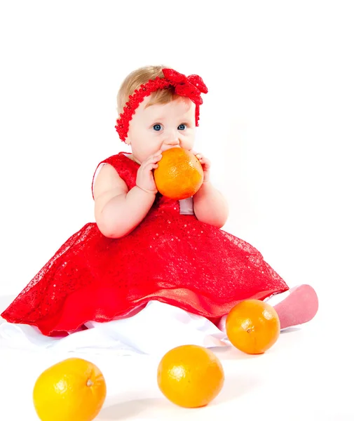The girl and oranges — Stock Photo, Image