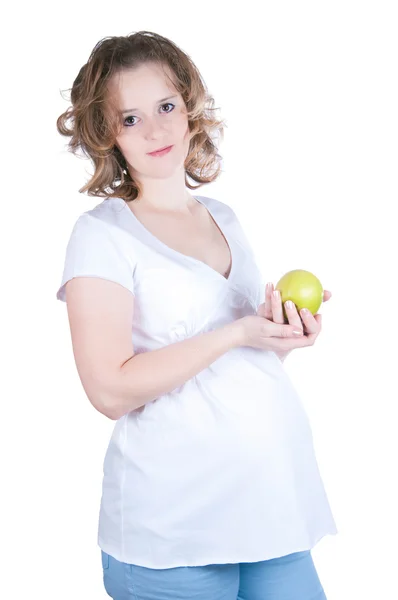 Pregnant woman holding apple — Stok fotoğraf