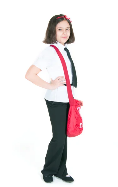La colegiala con una bolsa roja —  Fotos de Stock