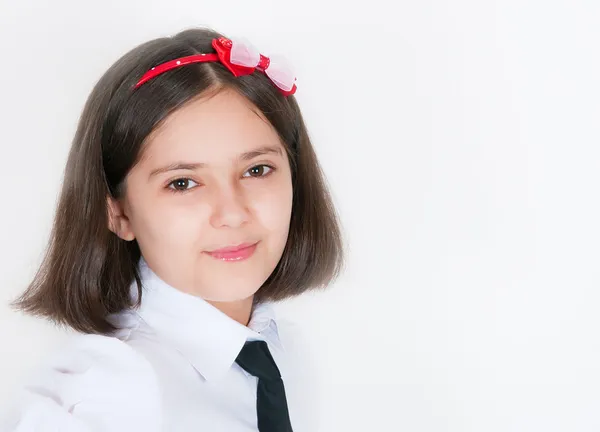 De schoolmeisje in een uniform — Stockfoto