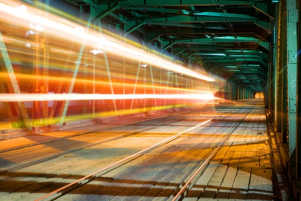 stock image Train speeding on the bridge