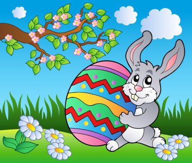 Spring meadow with bunny and egg clipart