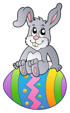 Bunny on Easter egg clipart