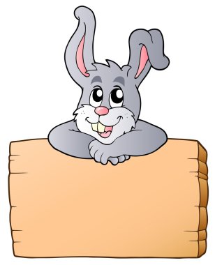 Wooden board with lurking bunny clipart