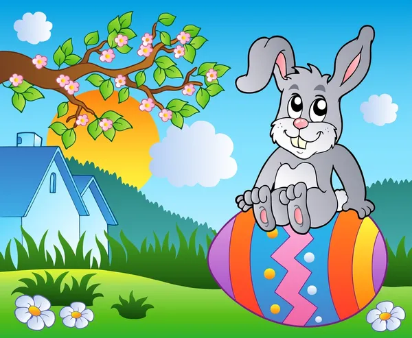 草甸与关于复活节彩蛋的兔子 — 图库矢量图片
