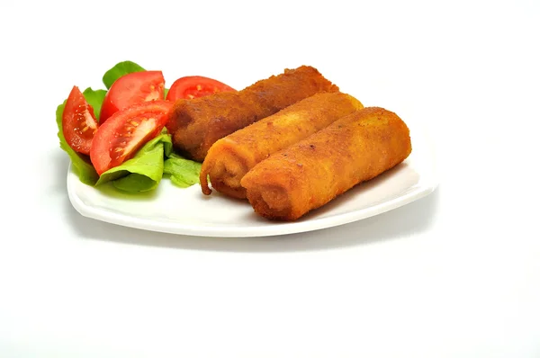 Polish Cuisine. Croquette and tomato on white plate. — Stock Photo, Image