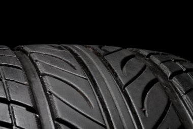 car tire, photo on the black background clipart