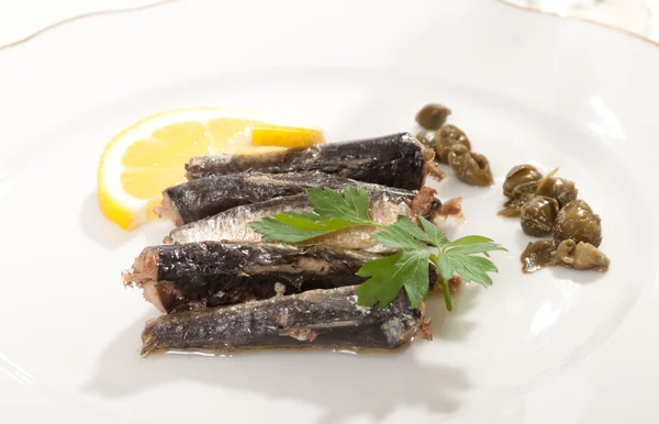 stock image Sardines with olives