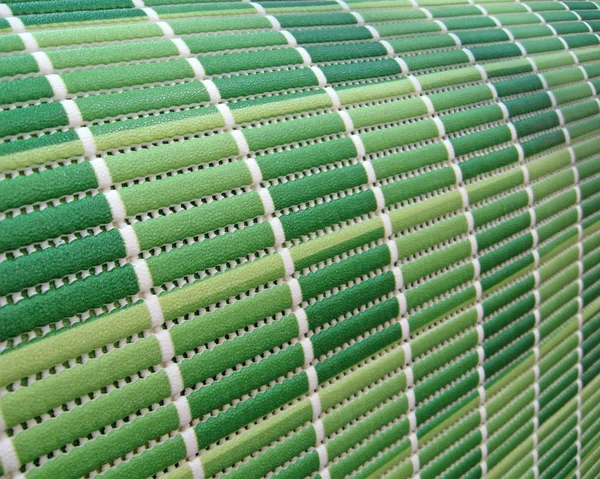 Green industrial roll pack, stripped texture close seup — стоковое фото