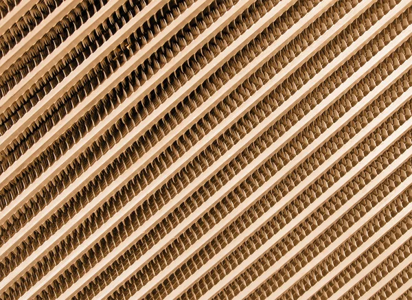 Rejilla metálica moderna dorada superficie industrial — Foto de Stock
