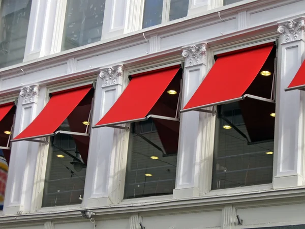 stock image Few red building windows, construction details