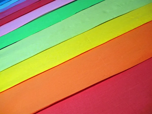 抽象的な虹色織物, 背景のクローズ アップ — ストック写真