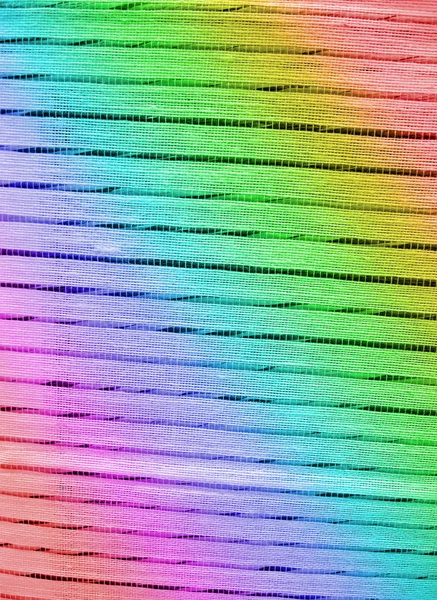 Astratto arcobaleno tessile primo piano, fondo stoffa — Foto Stock