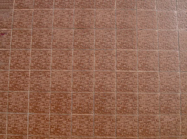 Parede de tijolo vermelho emoldurado, detalhes da construção . — Fotografia de Stock
