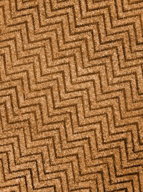 Abstract golden zigzag carpet background texture, wool. clipart