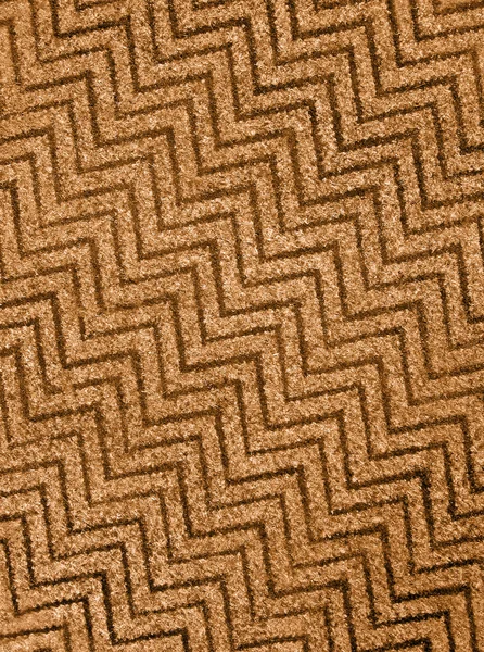 Abstract golden zigzag carpet background texture, wool. — Stock Photo, Image