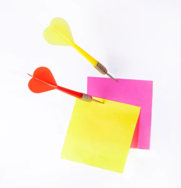 Darts and notes isolated on a white background. — Stock Photo, Image