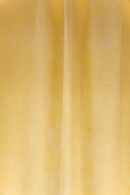 Yellow fabric background. clipart