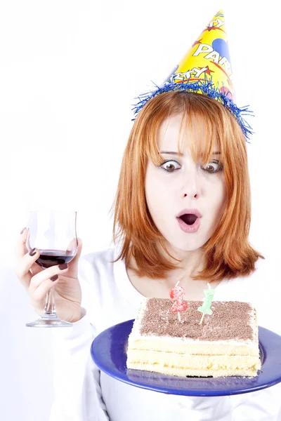 Red-haired with wine glass and cake celebrate her 21th birthday. — Stock Photo, Image