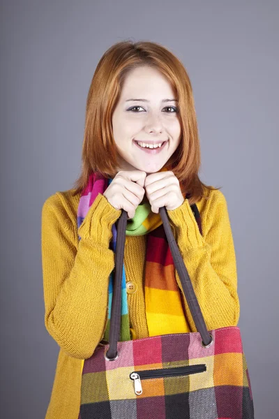 Portrait of red-haired girl in scarf. — Stock Photo, Image