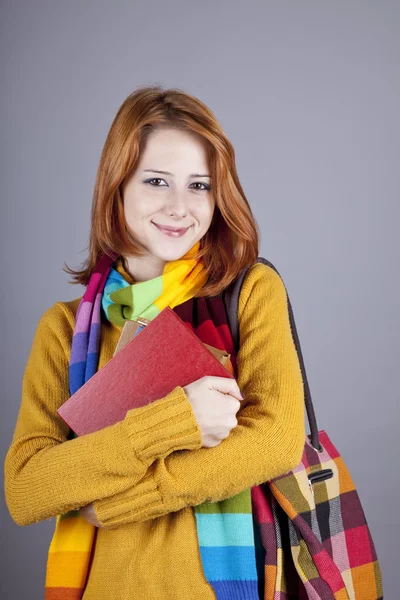 Молодая студентка с книгами. — стоковое фото