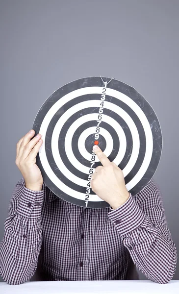 Boy with dartboard in place of head. — Stock Photo, Image