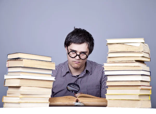 The young student with the books isolated. — Stock Photo, Image